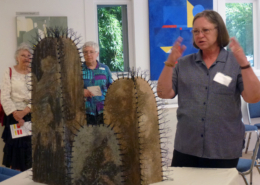 Dianne Corso discussing "Cactus" at show opening